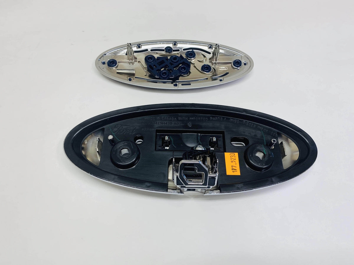 Tailgate Back Up Camera Housing Emblem J37456